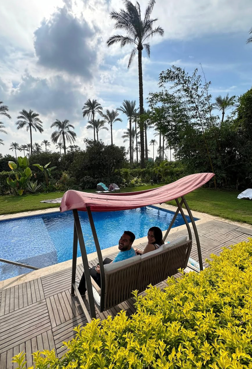 Poolside downtime at The Palms Gardens — Cairo farm day, Boreas land extension