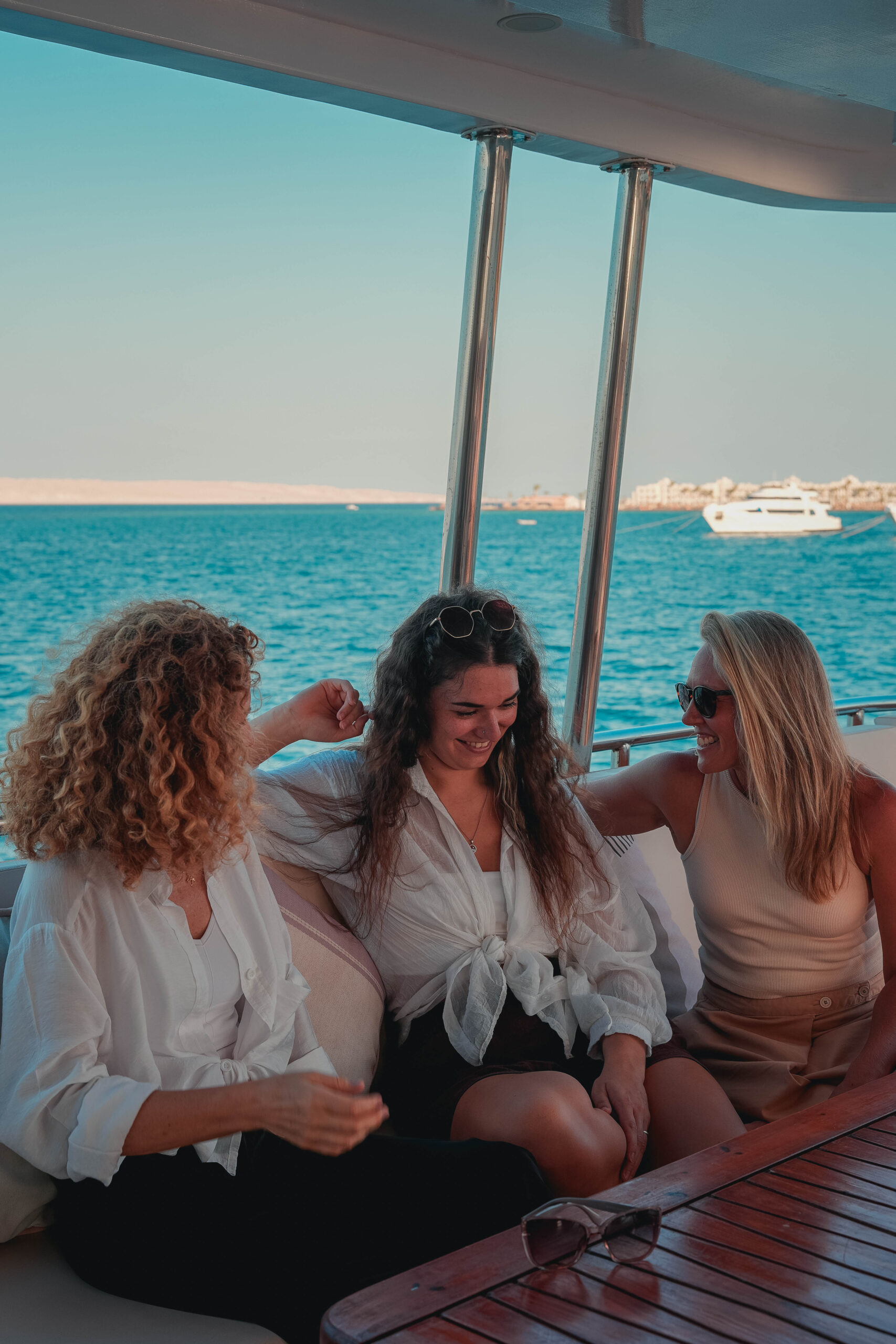Guests relaxing on board the Boreas superyacht — Red Sea wellness voyage