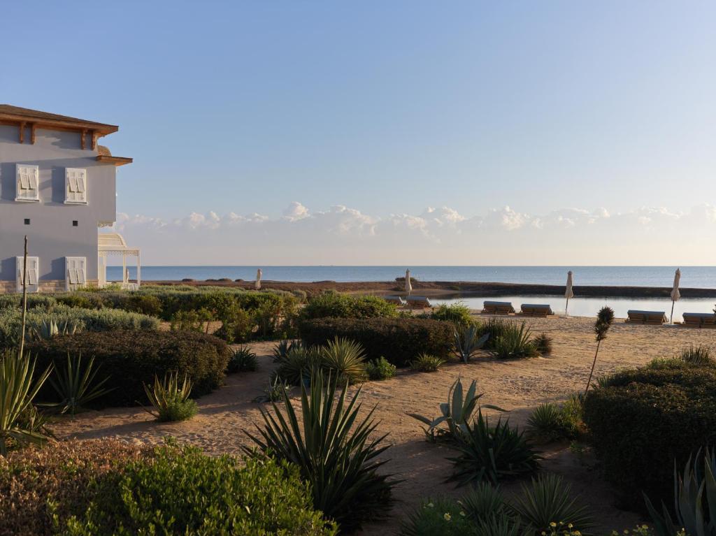 Private beach and lagoon at La Maison Bleue, El Gouna