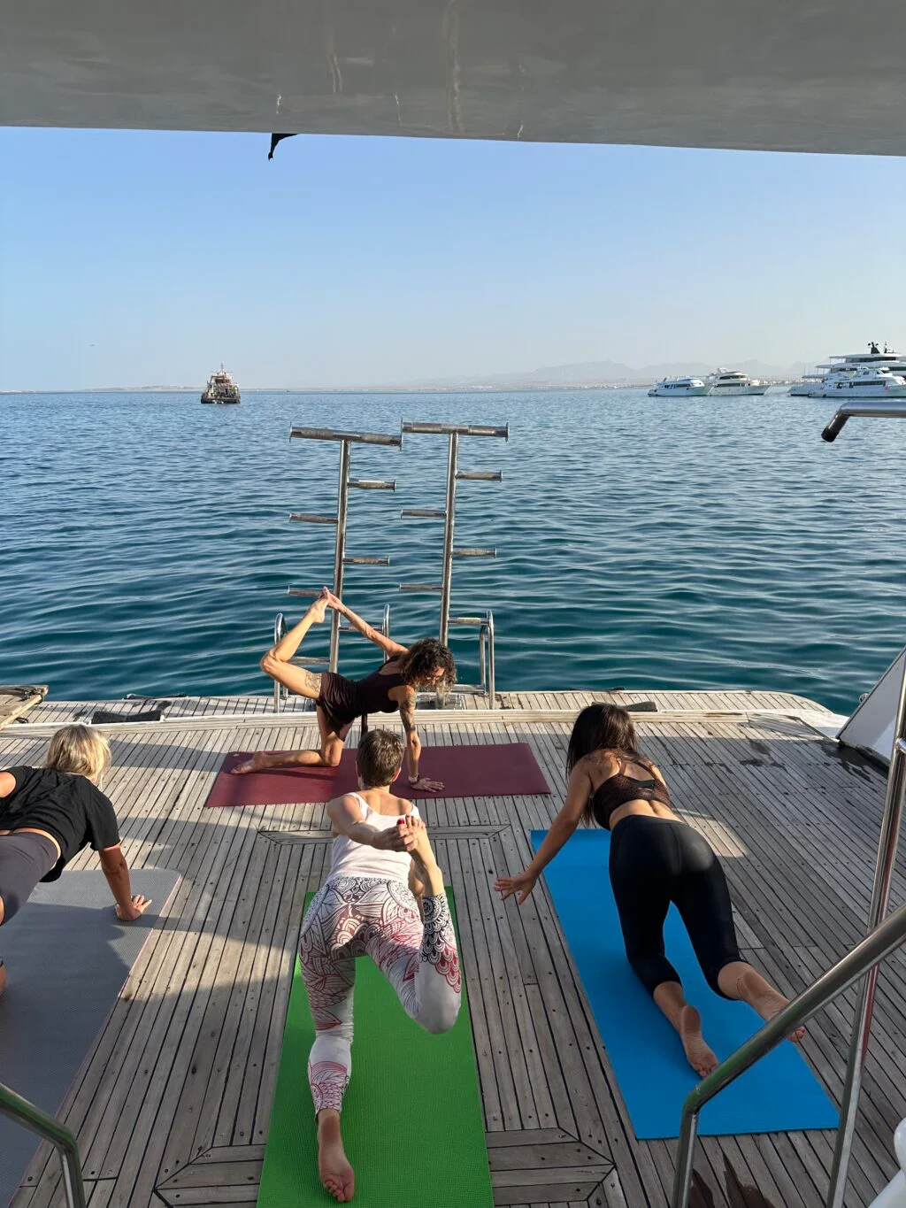 Yoga on the deck of a Red Sea liveaboard