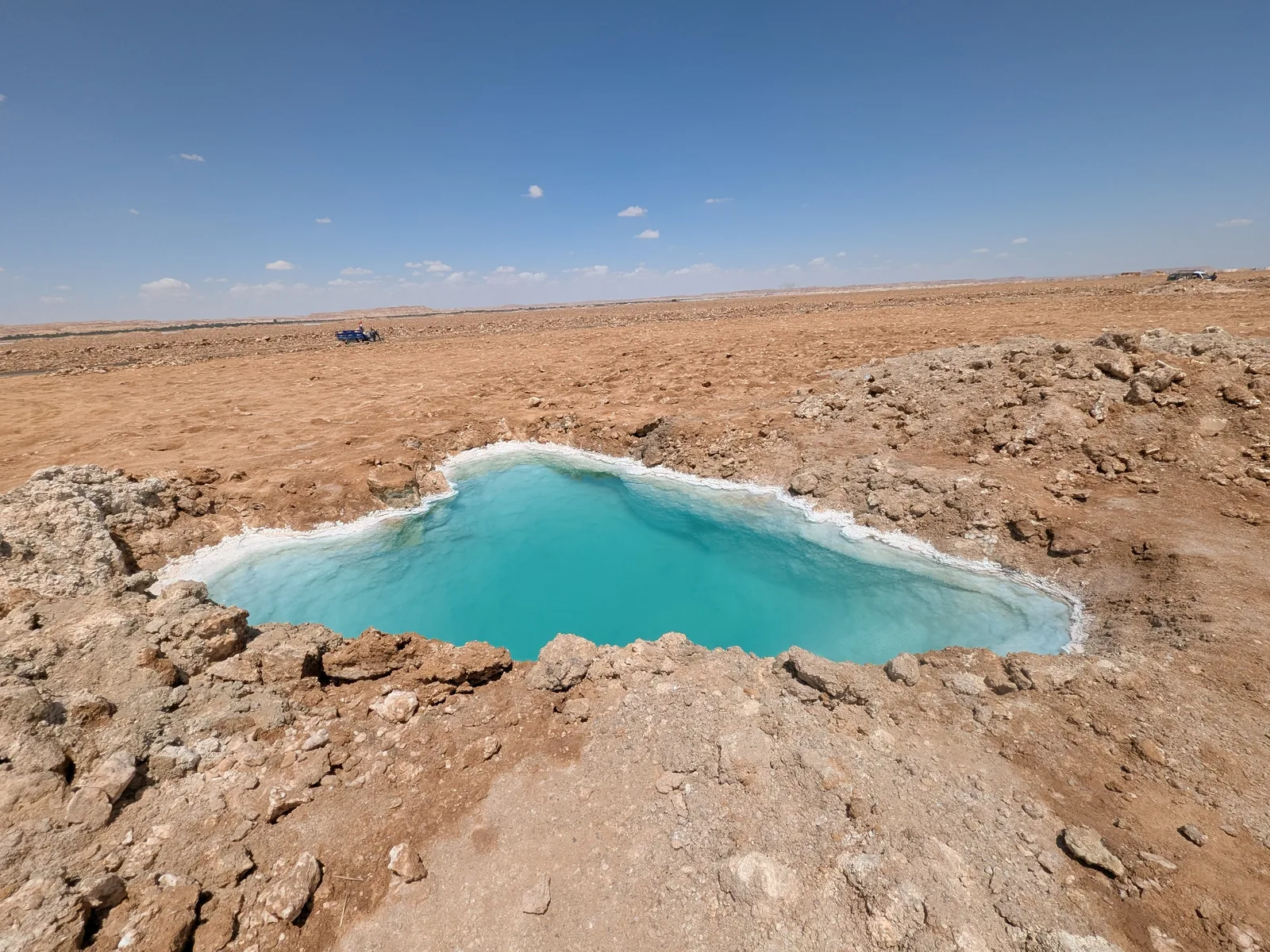 Small salt pool in open desert near Siwa, Egypt
