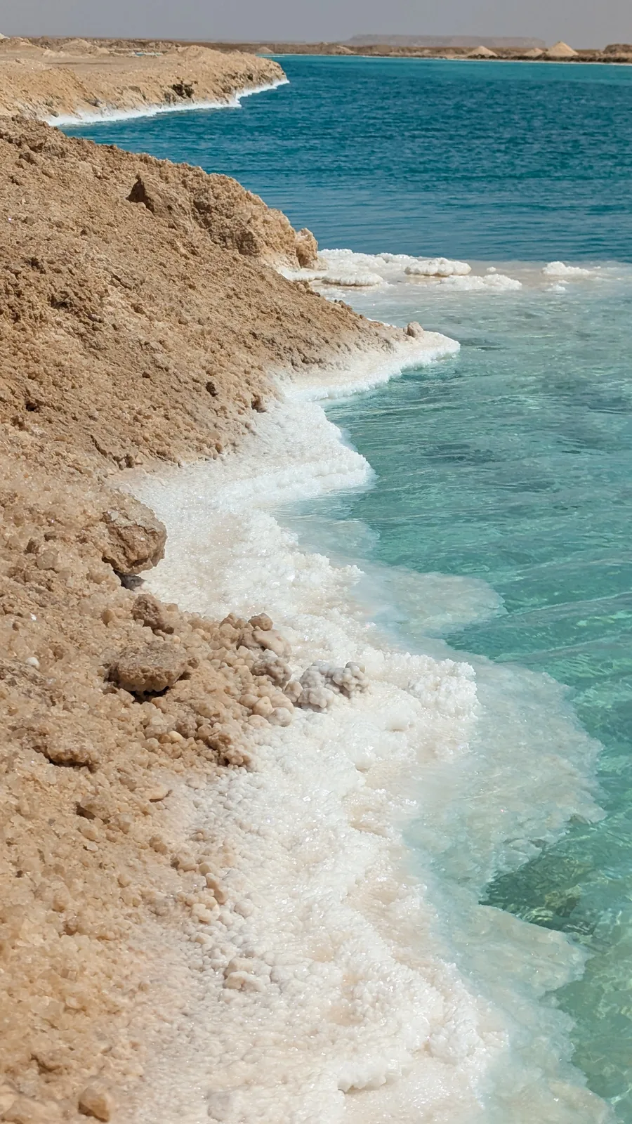 Blue salt lake shore at Siwa Oasis, Egypt